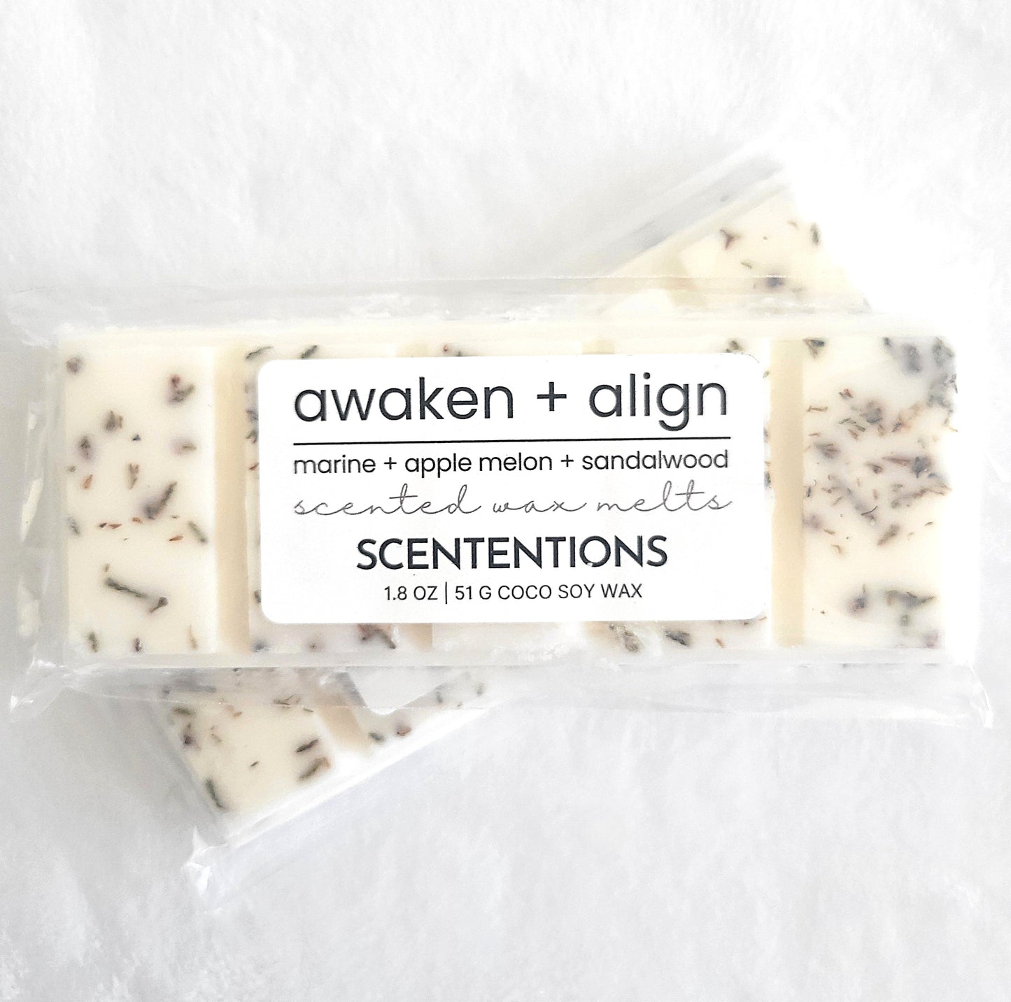 Awaken and Align coconut soy wax melt bar with dried flowers and herbs