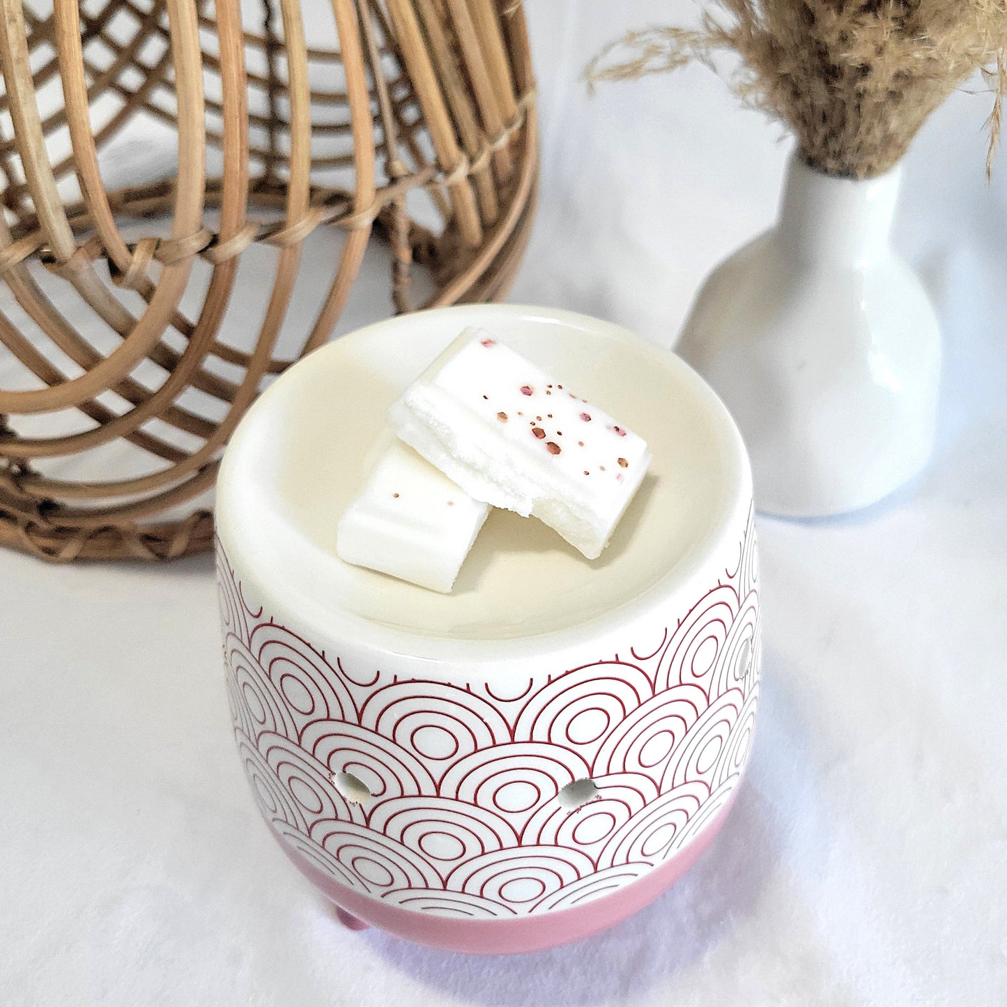 Wax melt piece in wax burner with clean calming fragrance