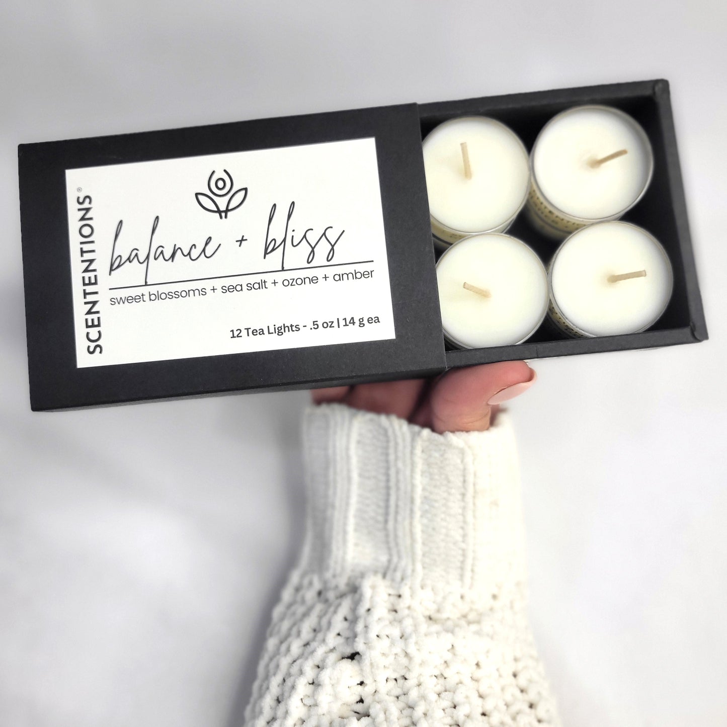 Balance + Bliss tea light set featuring 12 clean-burning coconut wax tea lights