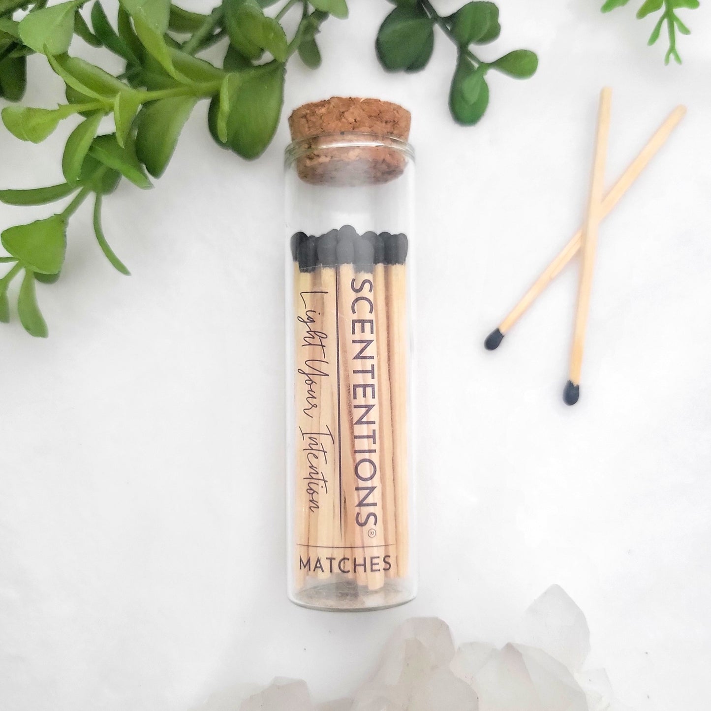 Black tip matches in a tall glass jar with cork lid. Decorative 4-inch matches, the perfect accessory to pair with Scententions candles.