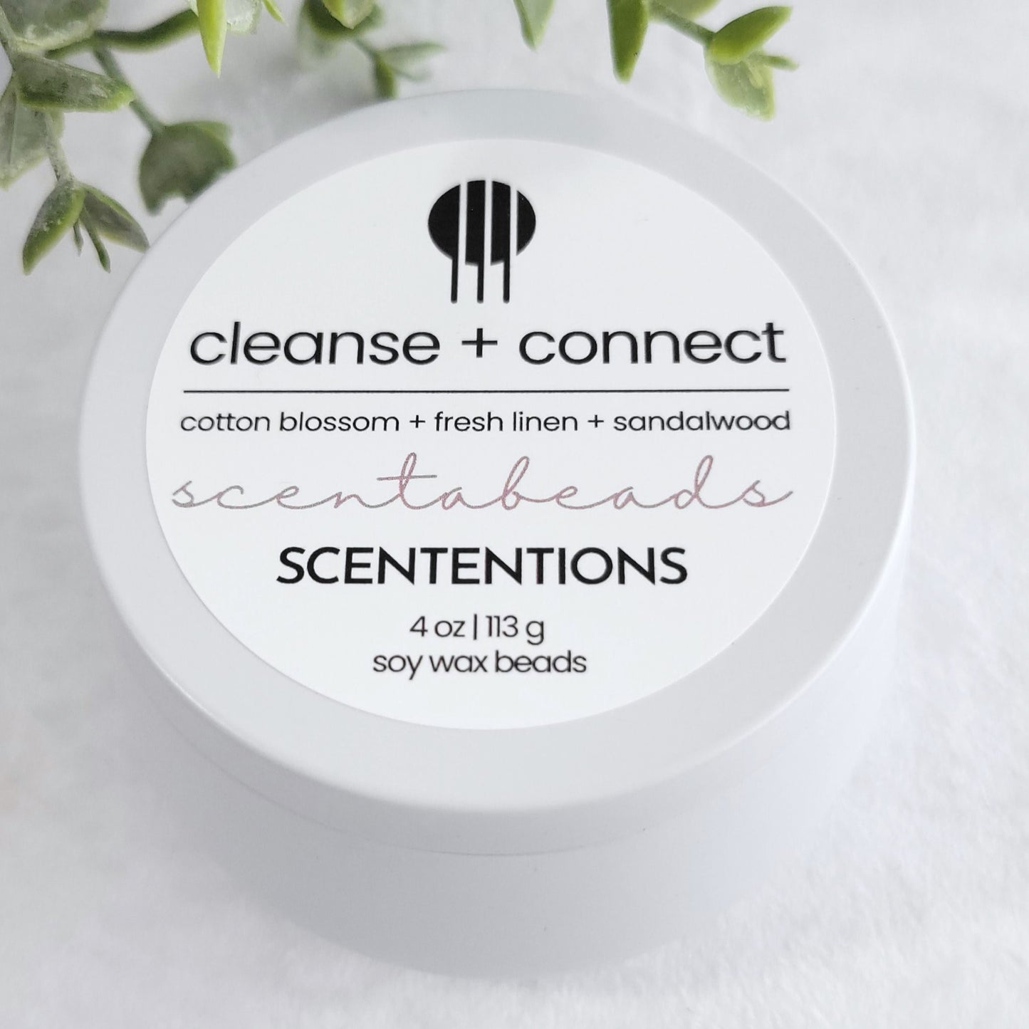 Cleanse + Connect wax melt beads with Cotton Blossom, Fresh Linen & Sandalwood in eco-friendly packaging