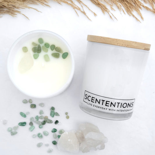 Explore + Expand candle with citrus, ginger, cinnamon clove, and amber scent in organic coconut wax by Scententions