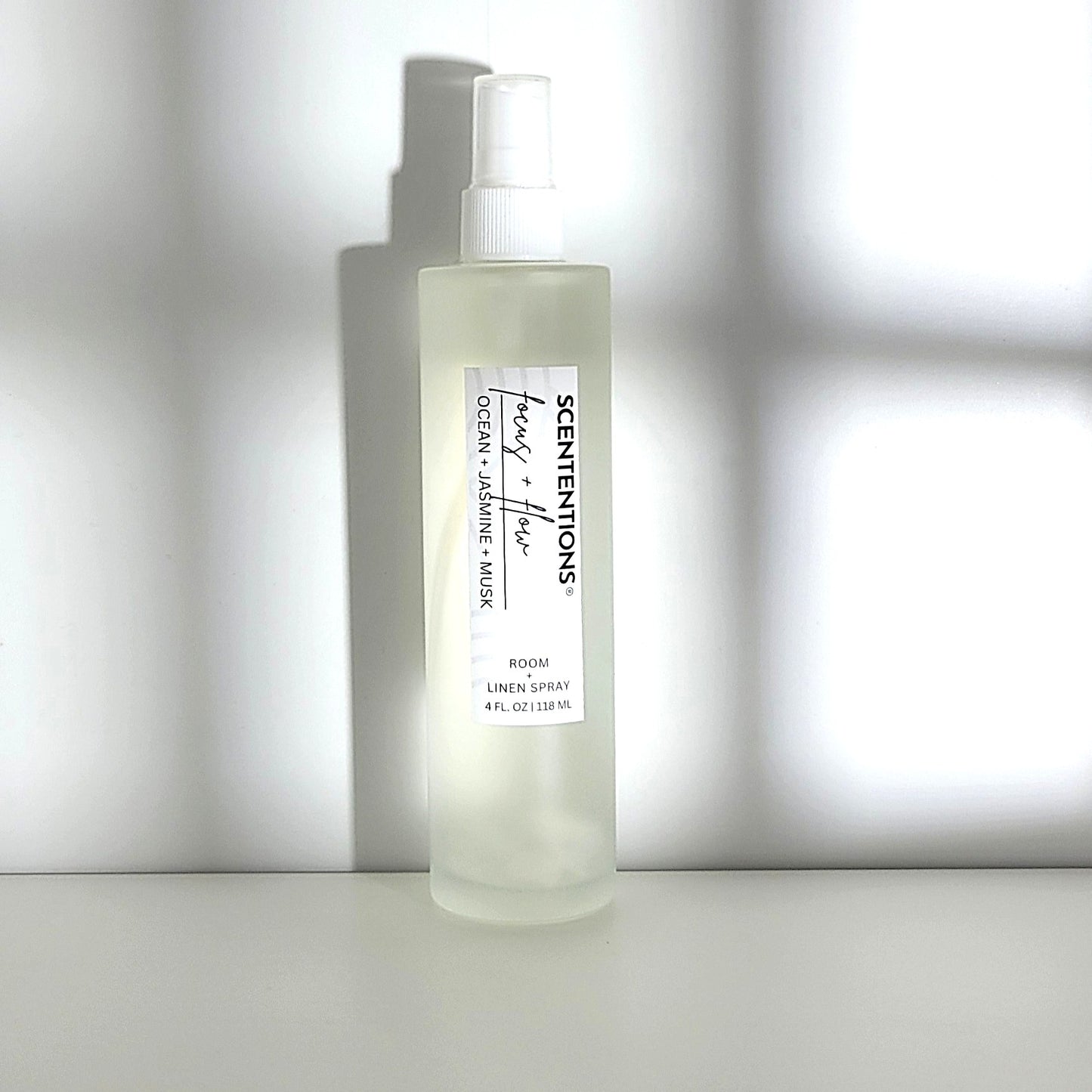 Focus + Flow room spray with ocean, jasmine, and musk notes for mental clarity and calm moments