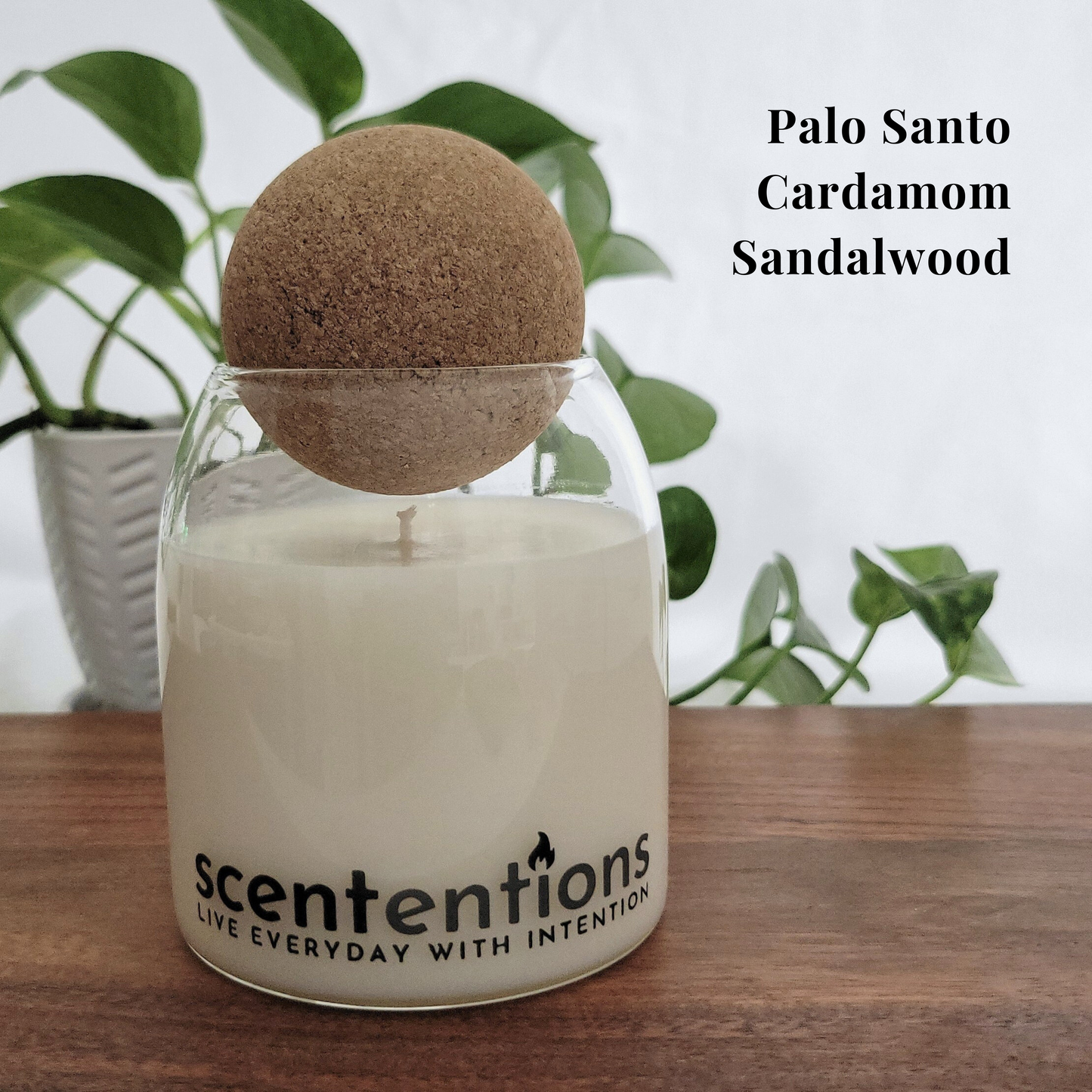 Peace + Release Signature Candle with cardamom, palo santo, and sandalwood, made with organic coconut wax by Scententions.