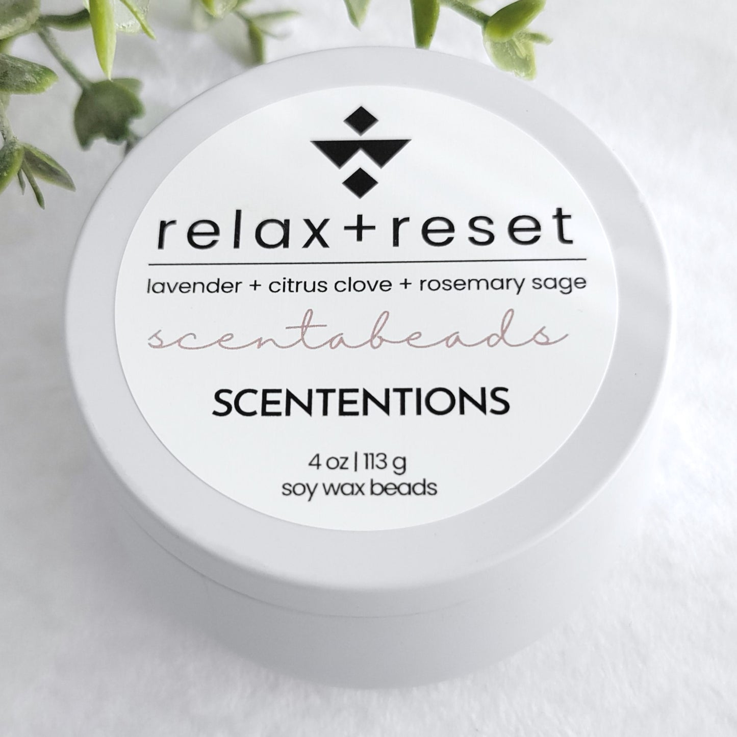 Relax + Reset soy wax melt beads with Lavender, Citrus, and Rosemary for calming aromatherapy