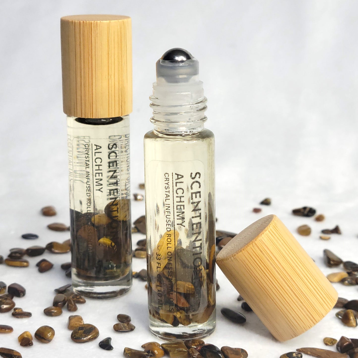Alchemy crystal infused essential oil roll-on with frankincense, myrrh, and amber scent