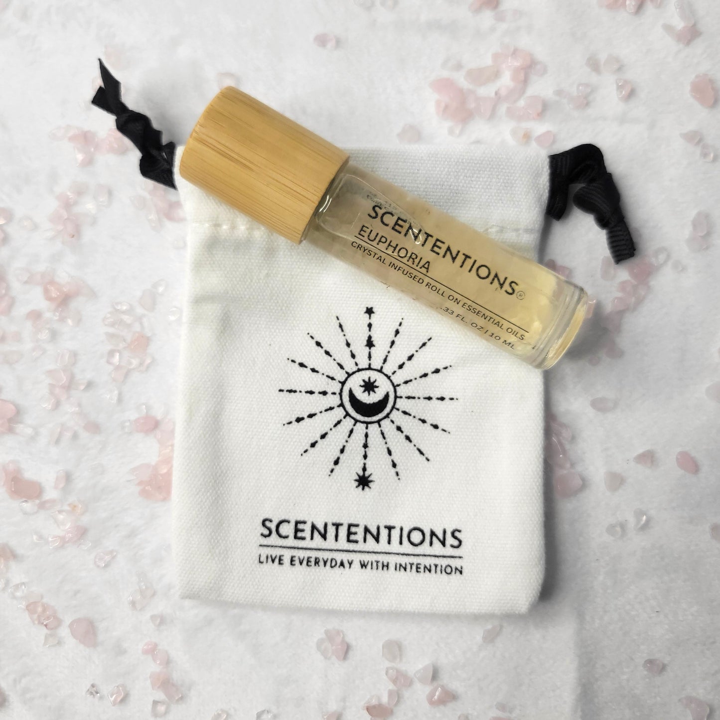 Euphoria crystal oil roll-on with bamboo lid and mini canvas storage bag