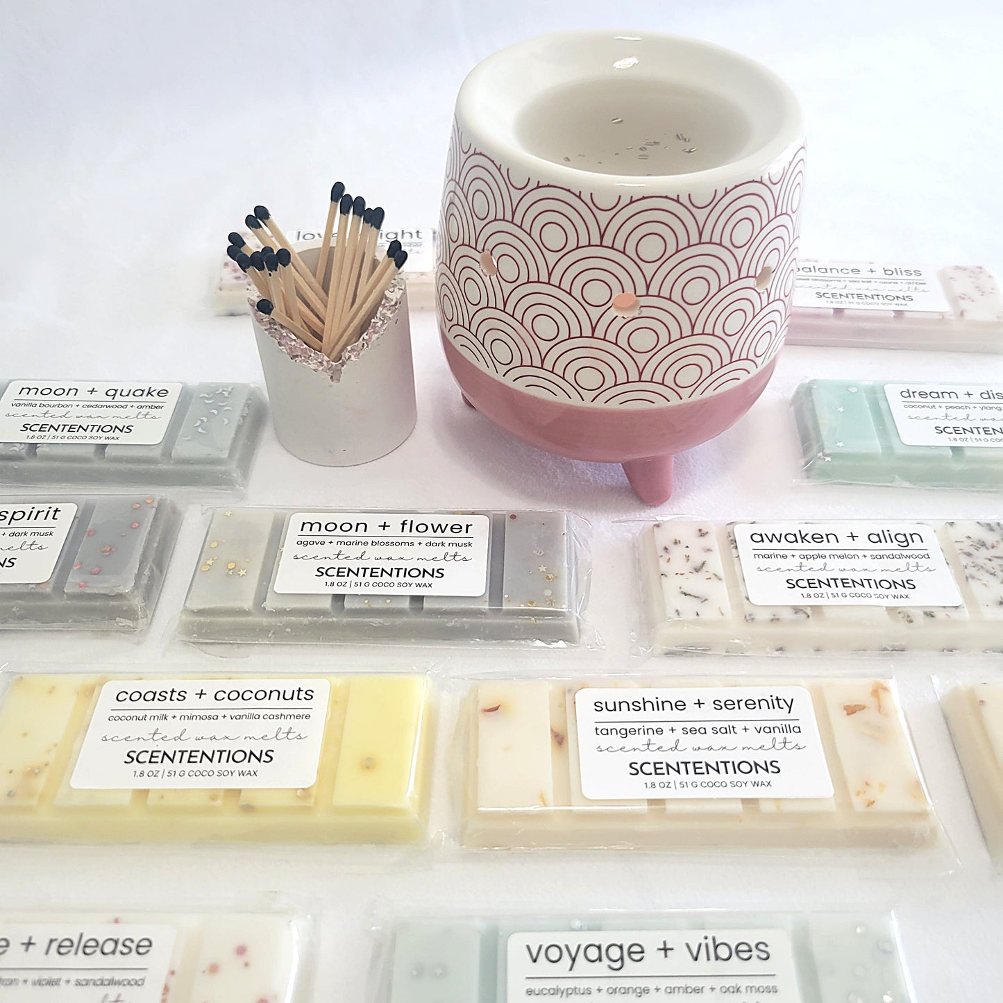 Moon + Flower wax melt melting in burner, releasing clean floral fragrance