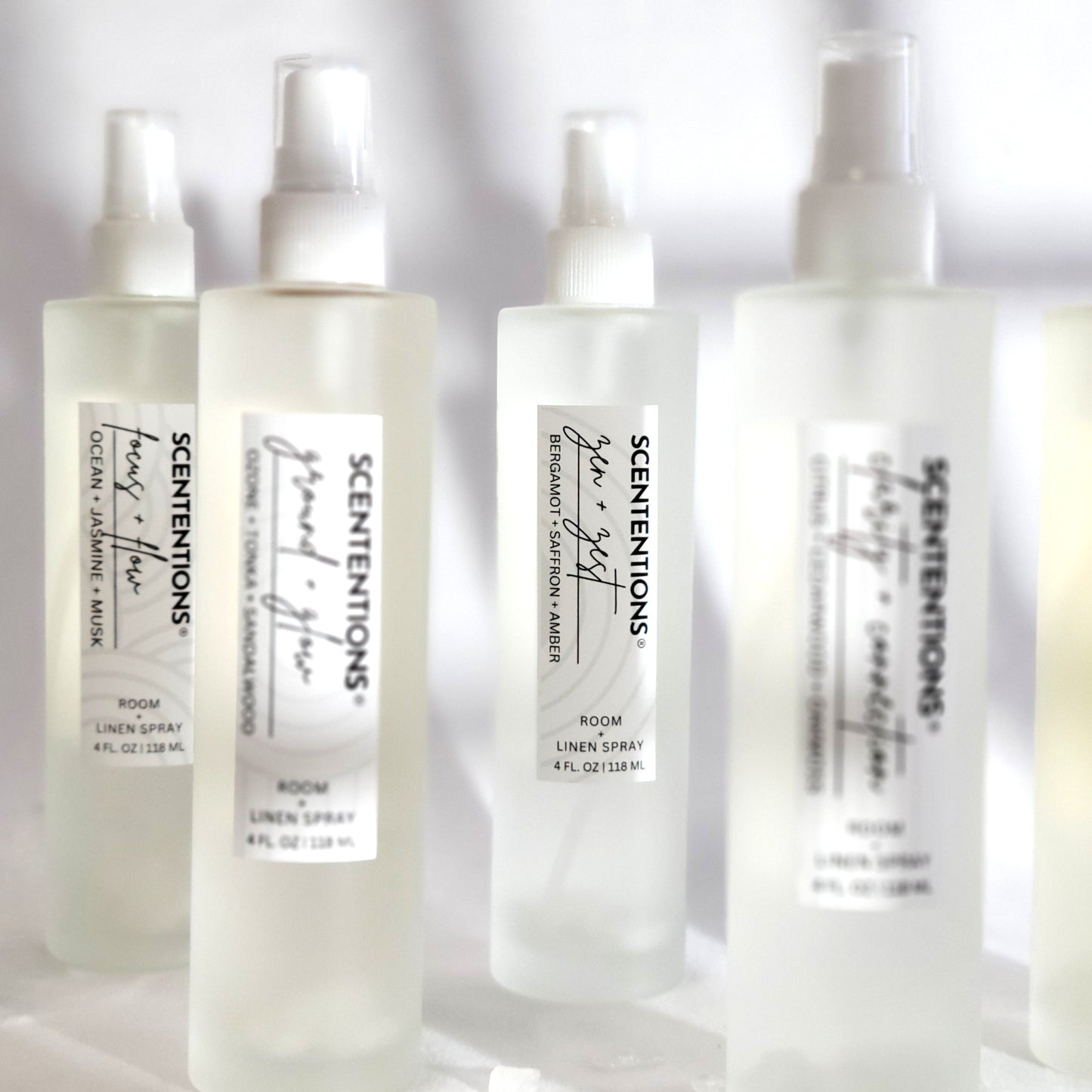 Lineup of Scententions crystal-infused organic room and linen sprays