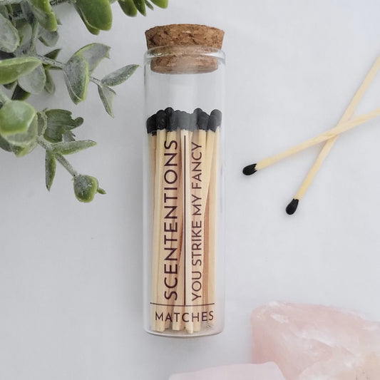 Black tip wood matches in a clear glass jar with cork top and striker base – elegant and reusable for home or gifting by Scententions