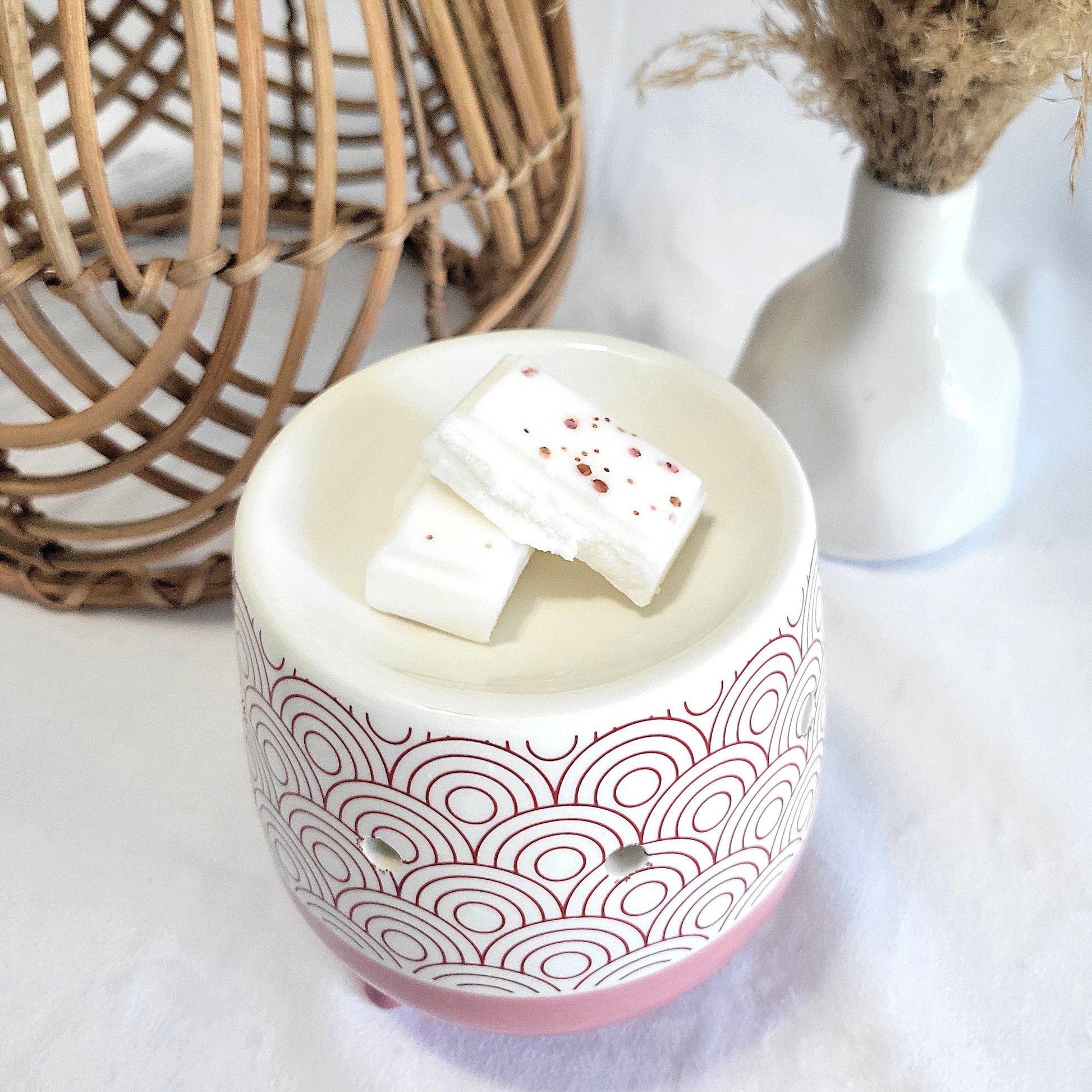 Wax melt piece in wax burner with clean calming fragrance