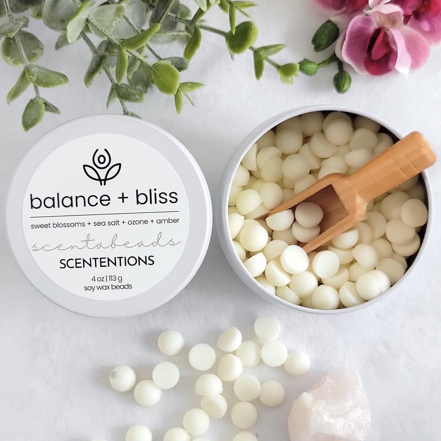 Balance + Bliss wax melt beads in eco-friendly tin with calming scent blend and reusable scoop by SCENTENTIONS