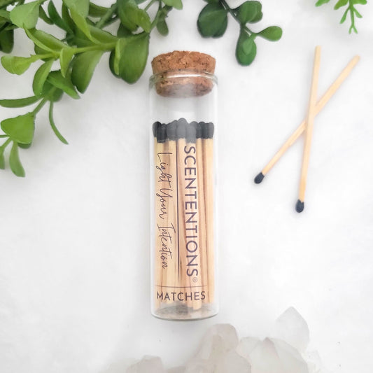 Black tip matches in a tall glass jar with cork lid. Decorative 4-inch matches, the perfect accessory to pair with Scententions candles.