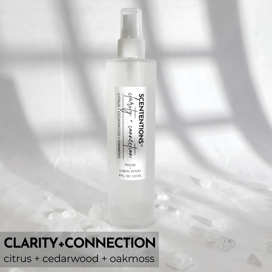Clarity + Connection room spray featuring citrus, cedarwood, and oak moss notes for mental focus and grounding