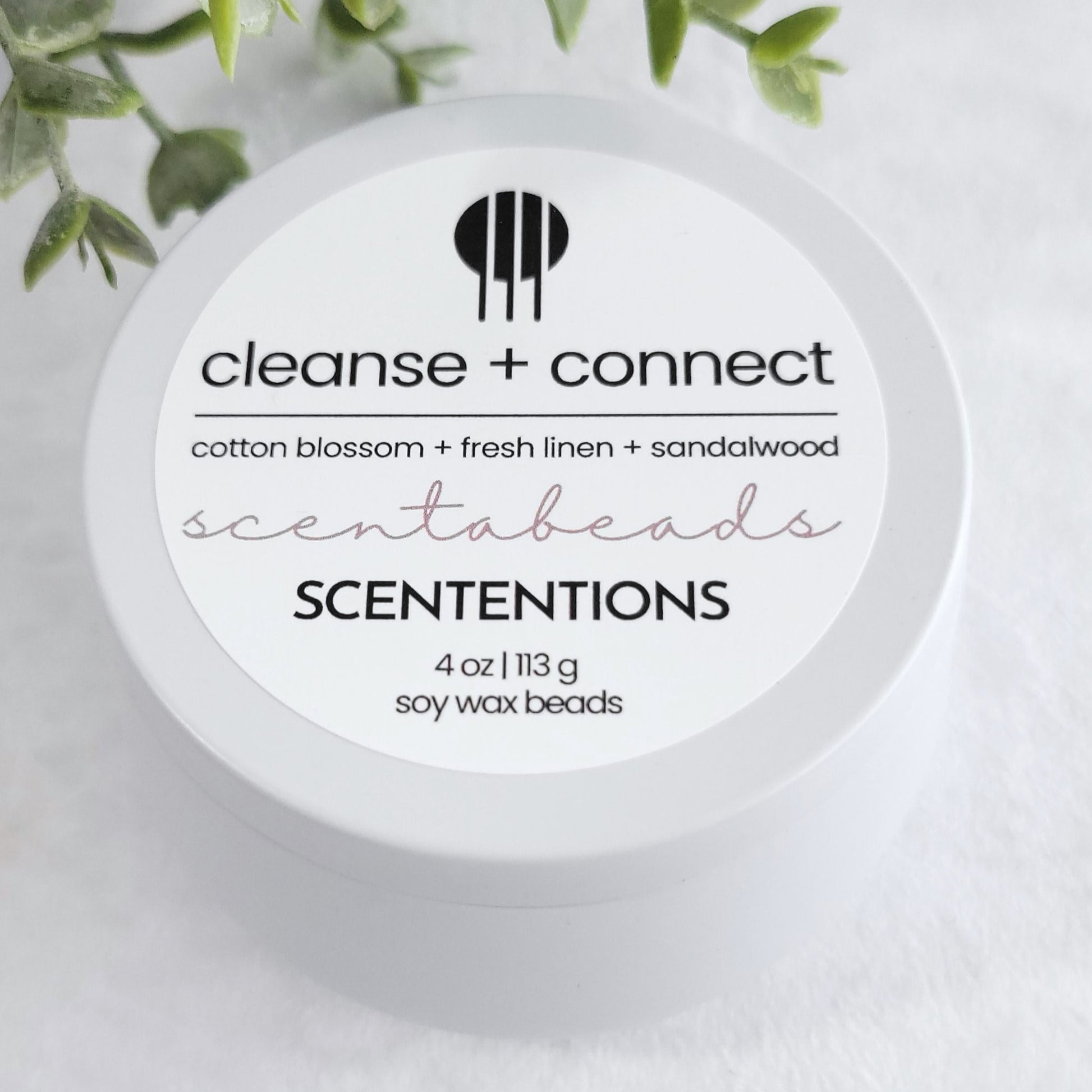 Cleanse + Connect wax melt beads with Cotton Blossom, Fresh Linen & Sandalwood in eco-friendly packaging