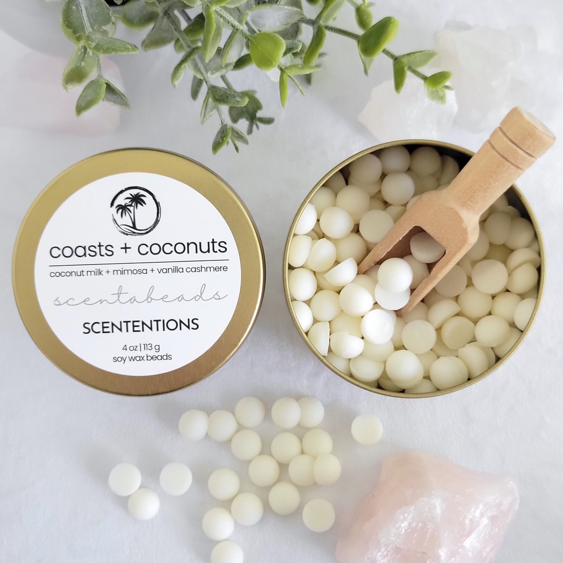 Coasts + Coconuts wax melt beads in eco-friendly tin with sunlit tropical scent blend and scoop by Scententions.