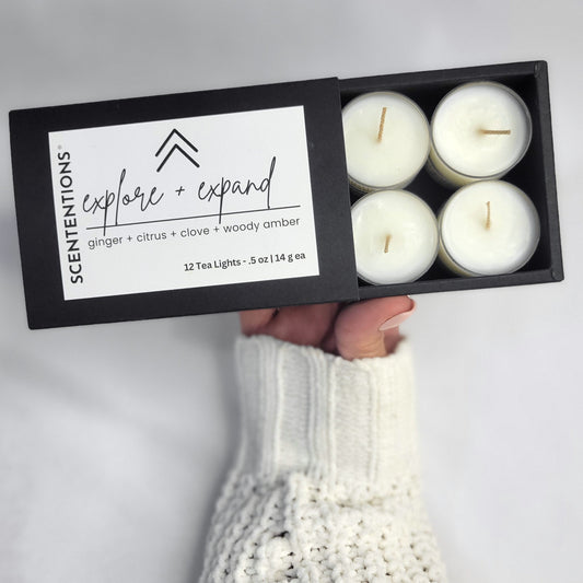 Explore + Expand tea light set with citrus, ginger, and cinnamon scent styled for manifestation rituals by Scententions