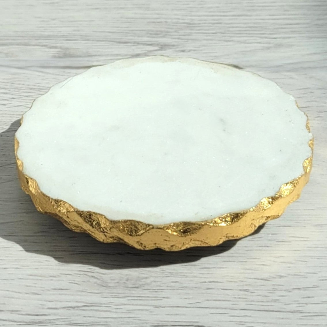 Gold rim white marble candle coaster