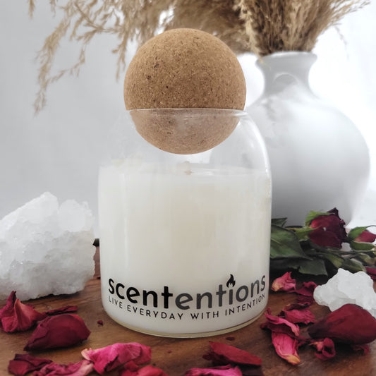 Love + Harmony candle made with organic coconut wax featuring oud, sweet rose, and earthy musk — by Scententions