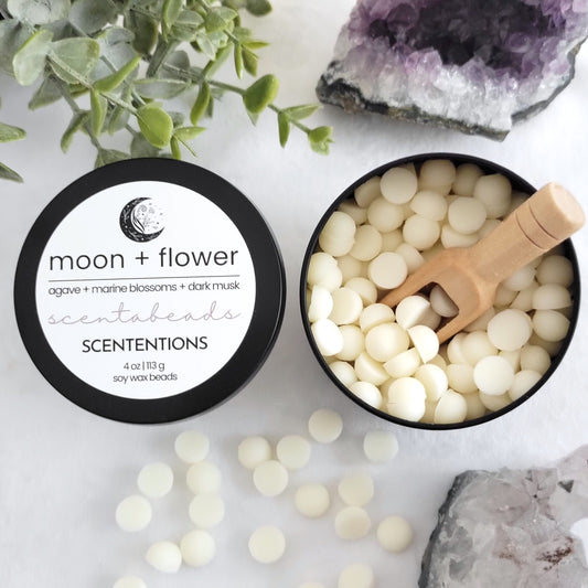 Moon + Flower soy wax melt beads with Sweet Agave, Marine Blossoms, and Dark Musk for emotional clarity and intuition