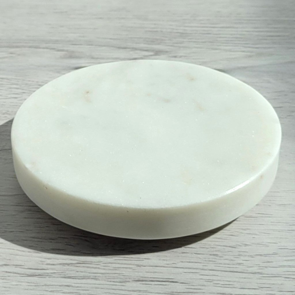 Round white marble candle coaster