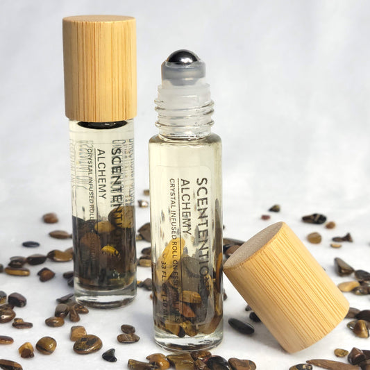 Alchemy crystal infused essential oil roll-on with frankincense, myrrh, and amber scent