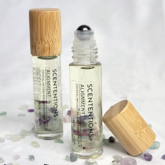 Alignment crystal infused essential oil roll-on with lemon, rosemary, and citrus scent