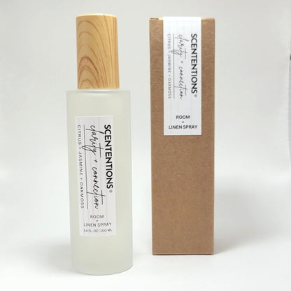 Clarity + Connection room and linen spray with packaging box on white background.