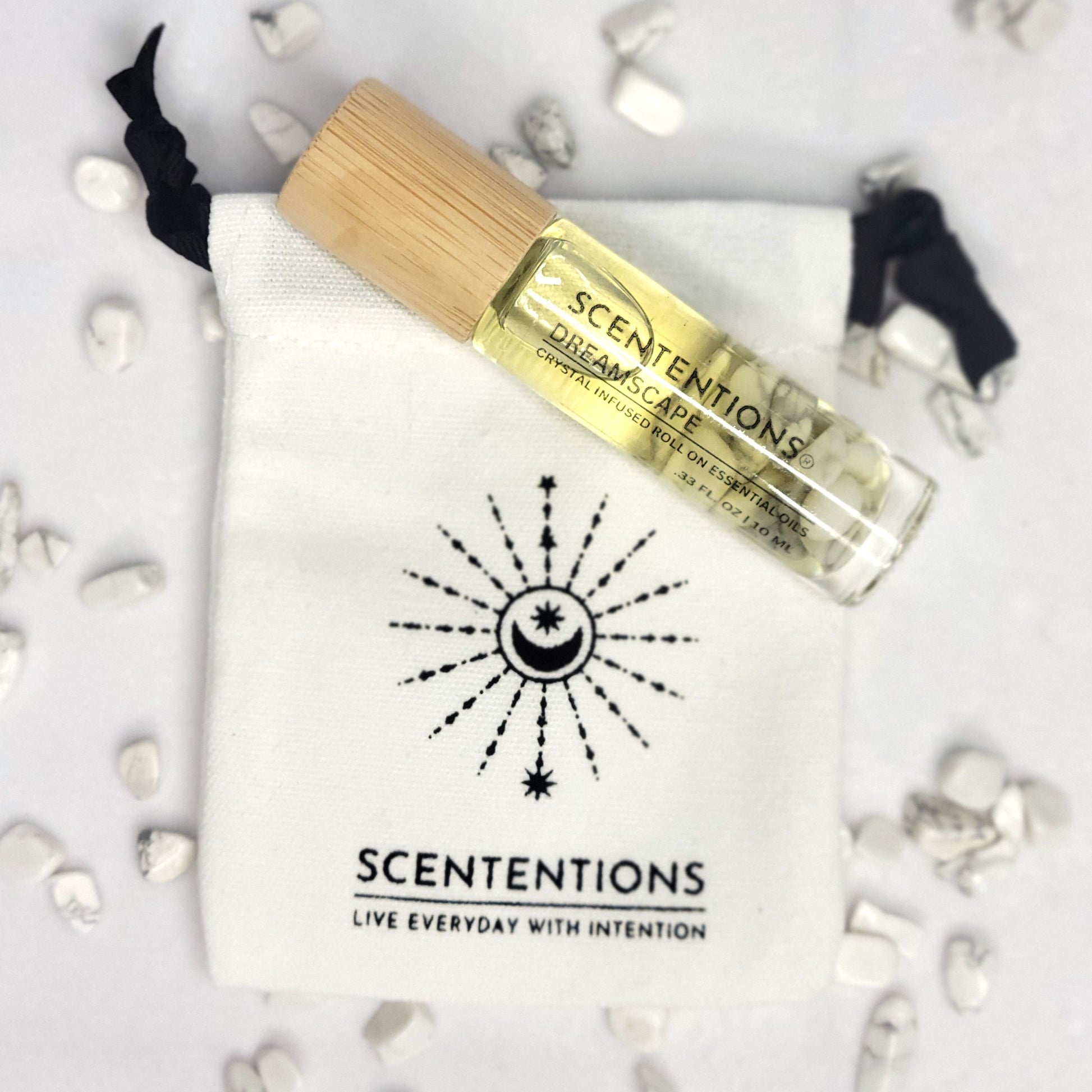 Dreamscape crystal oil roll-on with bamboo lid and mini canvas storage bag