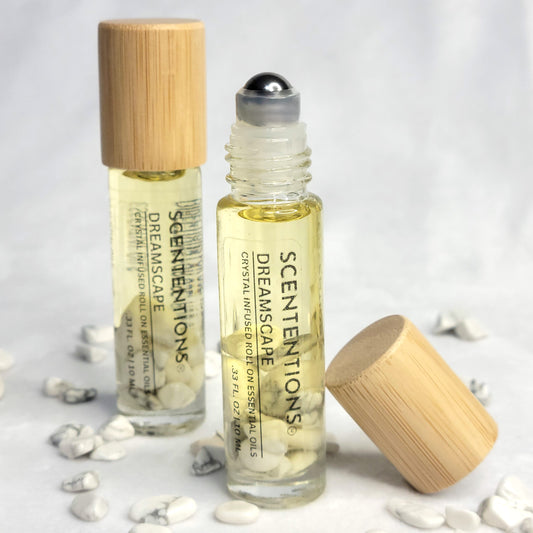 Dreamscape crystal infused essential oil roll-on with lavender, bergamot, and cedarwood scent
