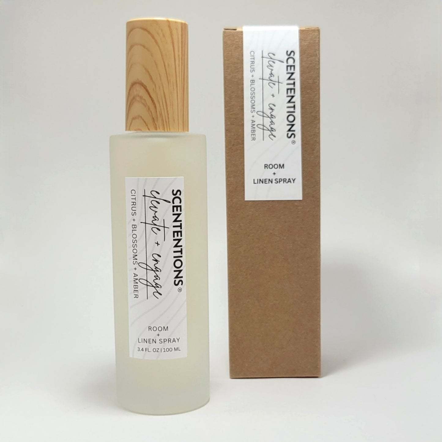 Elevate + Engage room and linen spray with packaging box on white background.