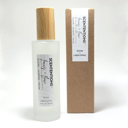 Focus + Flow room and linen spray with packaging box on white background.