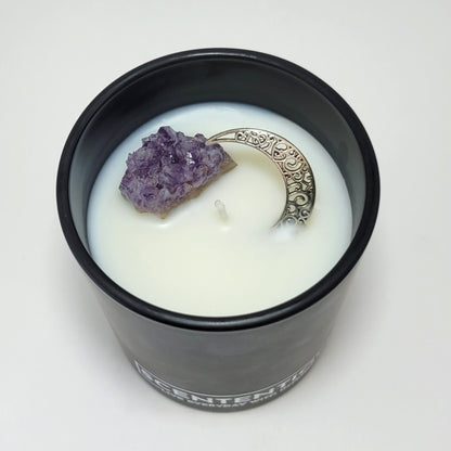 Moon + Bloom Moon Collection crystal coconut wax candle top view showing raw amethyst and silver moon charm in coconut wax.