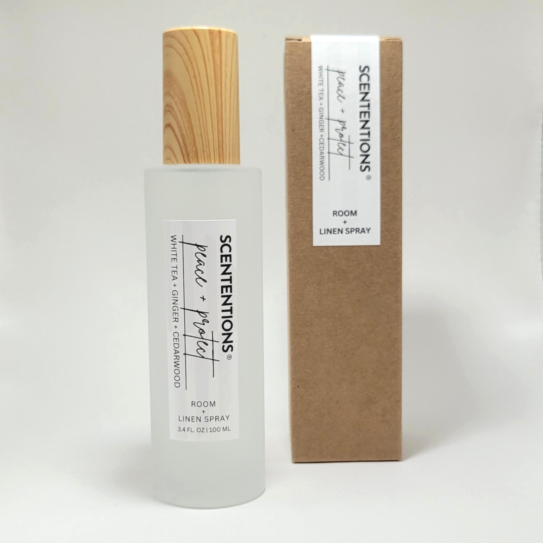 Peace + Protect room and linen spray with packaging box on white background.