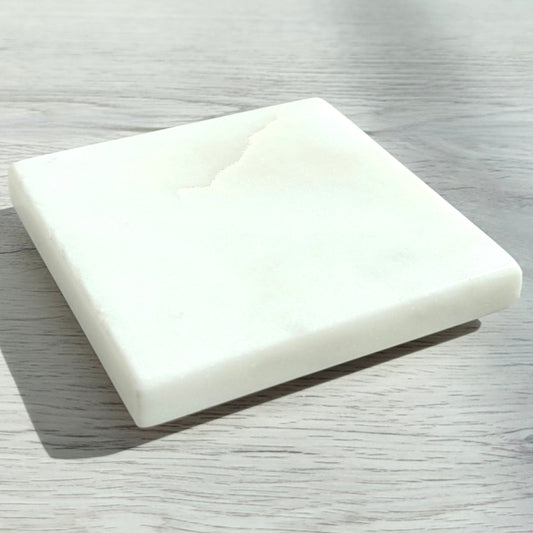Square white marble candle coaster
